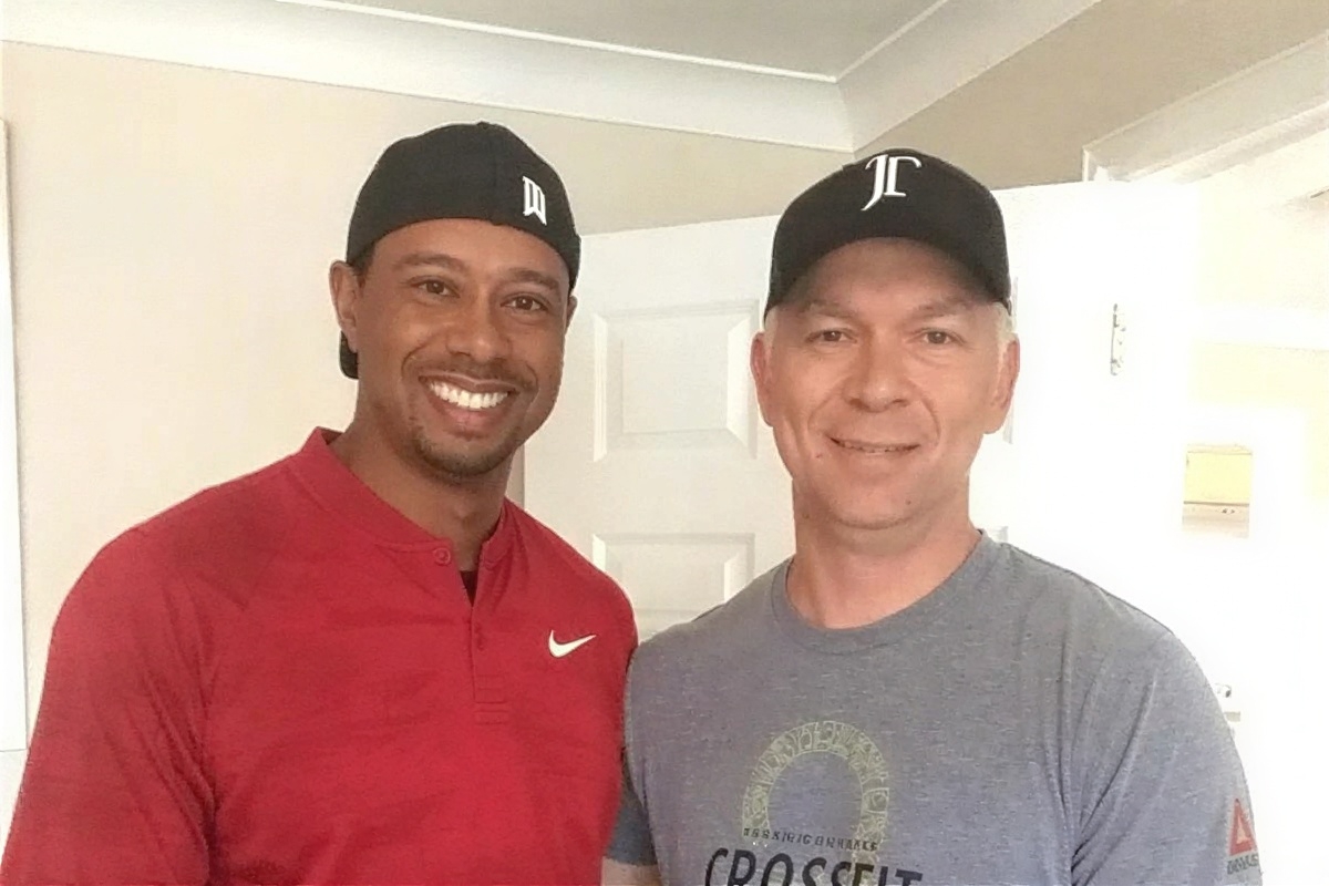 Dr. Troy Van Biezen with Tiger Woods