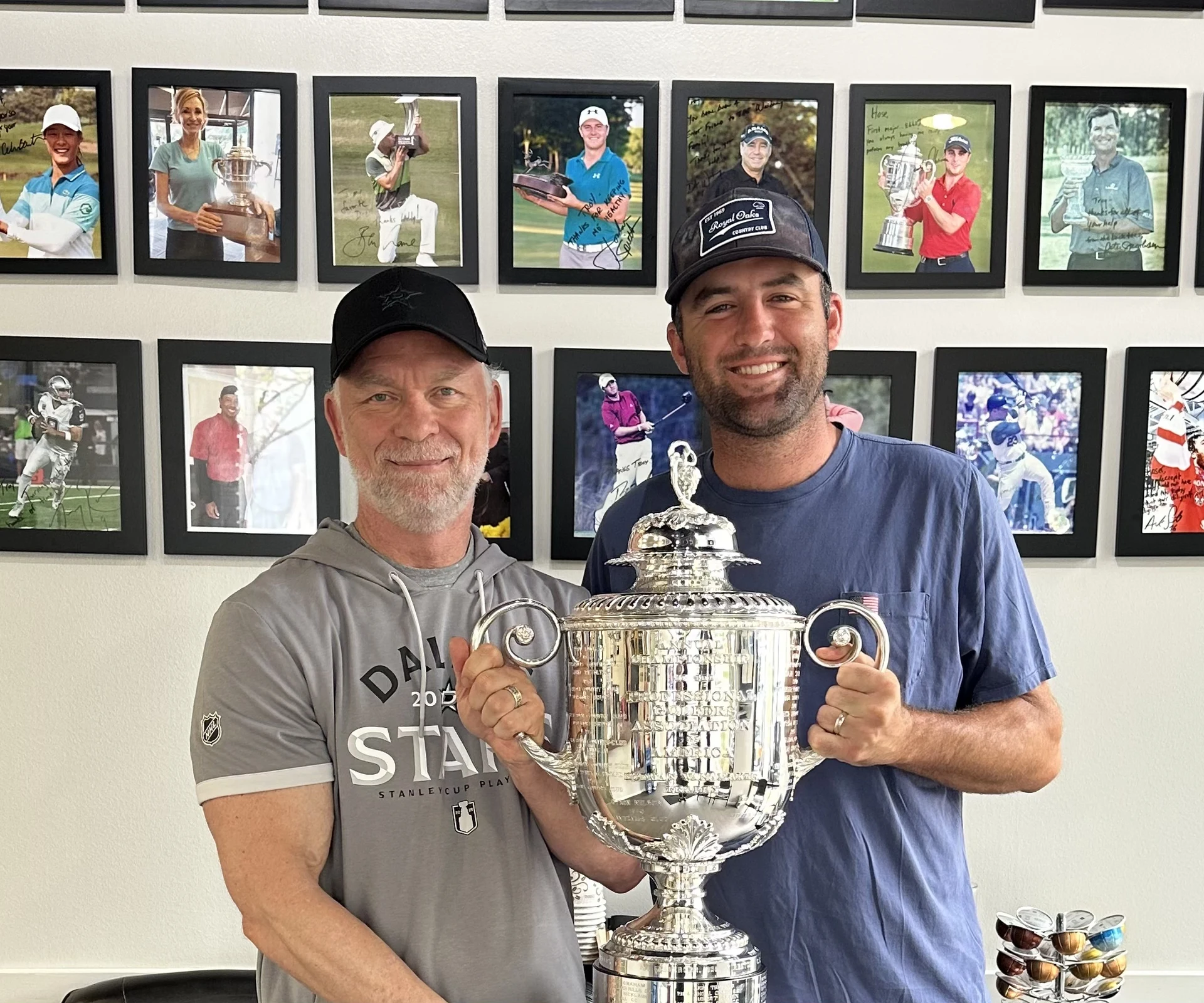 Dr. Troy Van Biezen holding the PGA Championship trophy